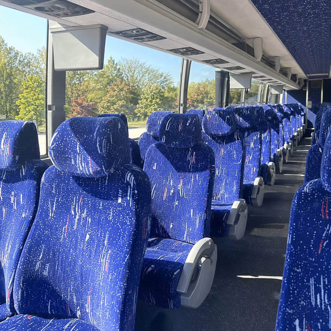 quincy 56 passenger charter bus inside